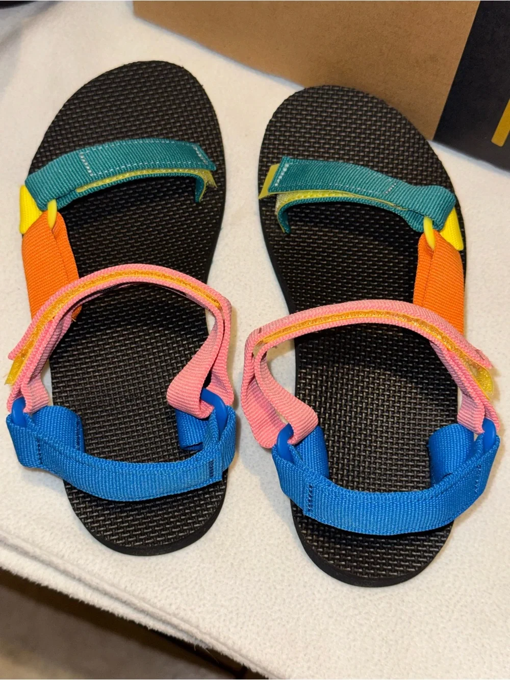Teva Original Universal sandals in a 90s multi-color pattern